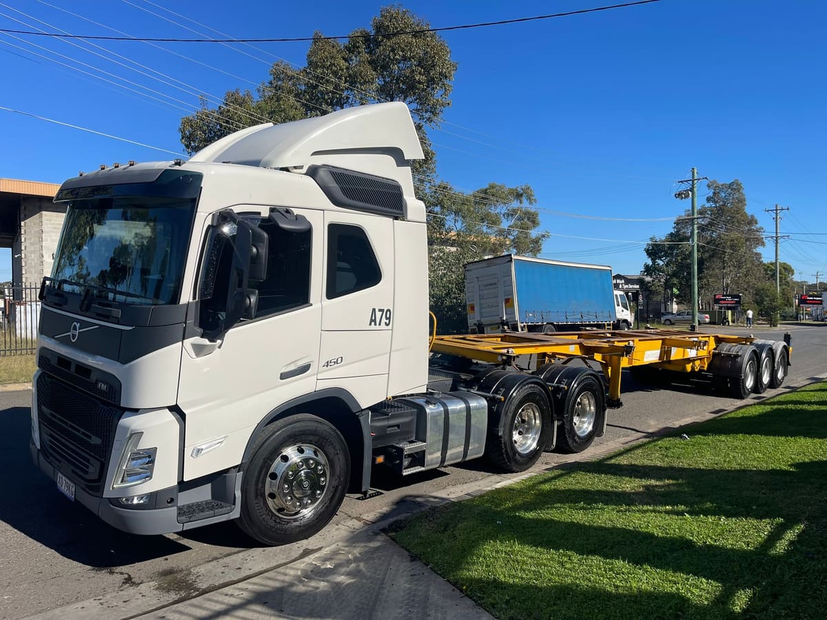 An Aardiv prime mover coupled to a skeletal container trailer